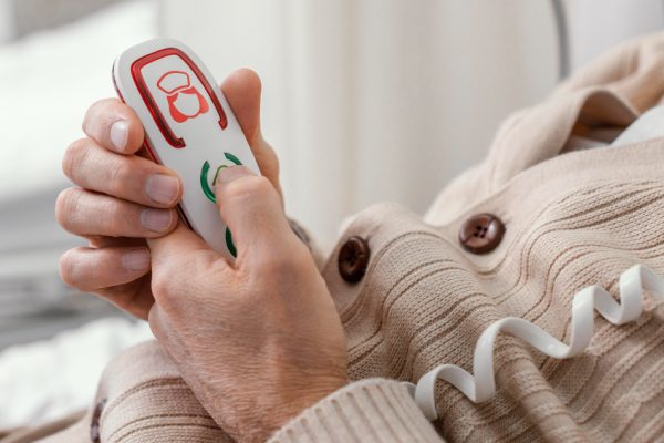 Close up patient pressing button