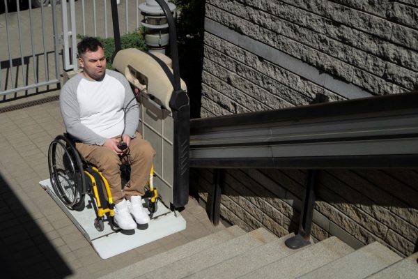 Electrician installing accessible electrical modifications for an NDIS home.