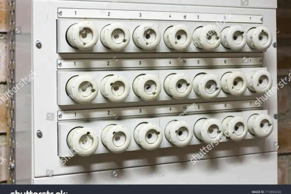 stock-photo-old-electrical-fuse-box-with-porcelain-fuses-715859260