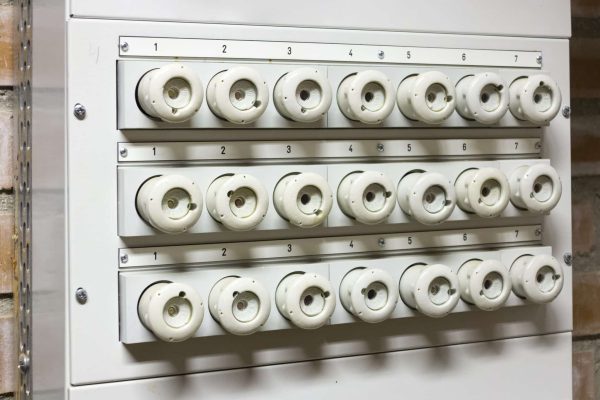 stock-photo-old-electrical-fuse-box-with-porcelain-fuses-715859260